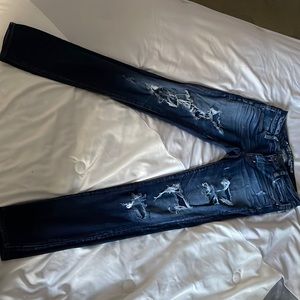 AMERICAN EAGLE DARK WASH RIPPED JEGGINGS